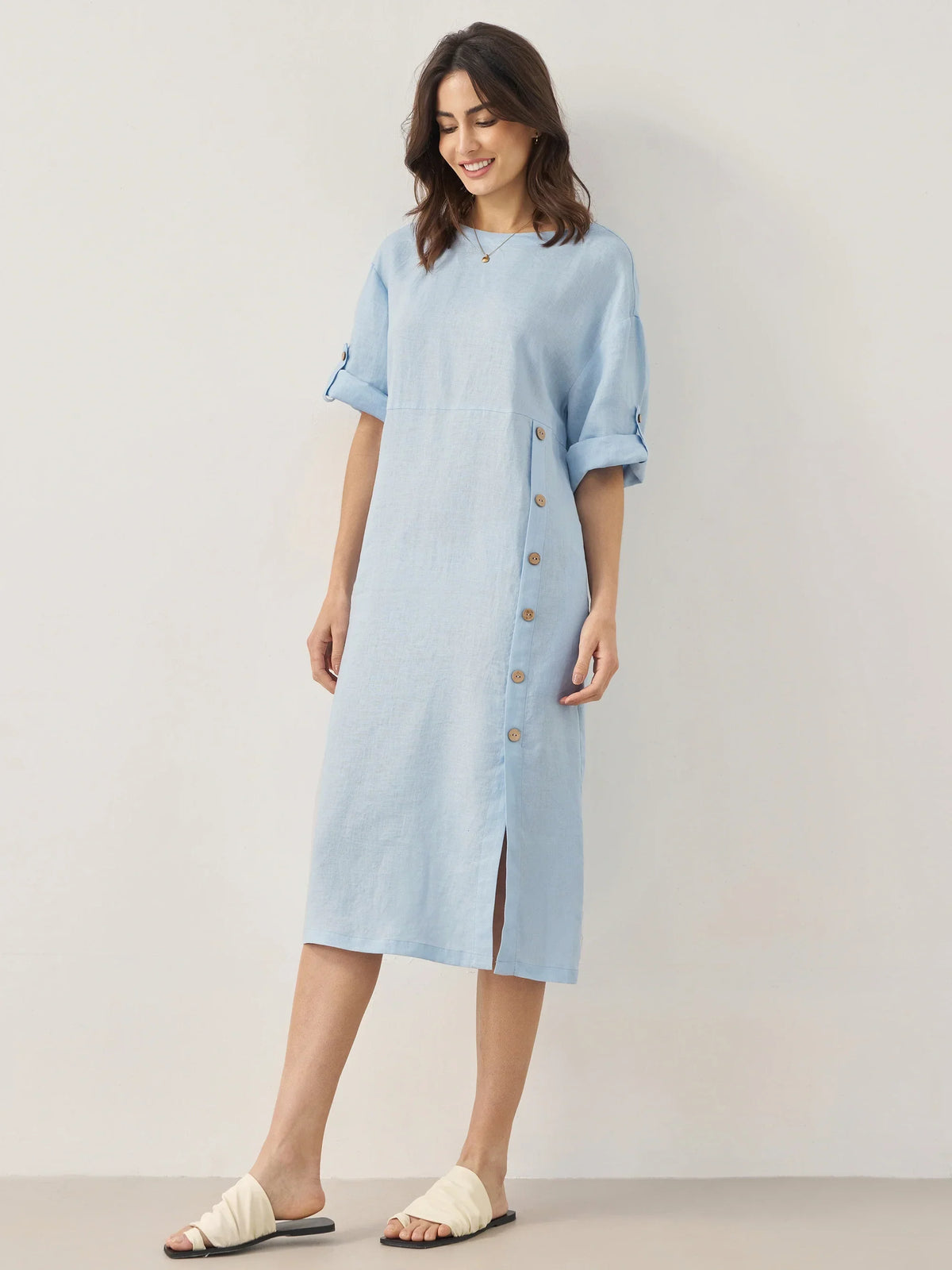 a woman in a light blue dress