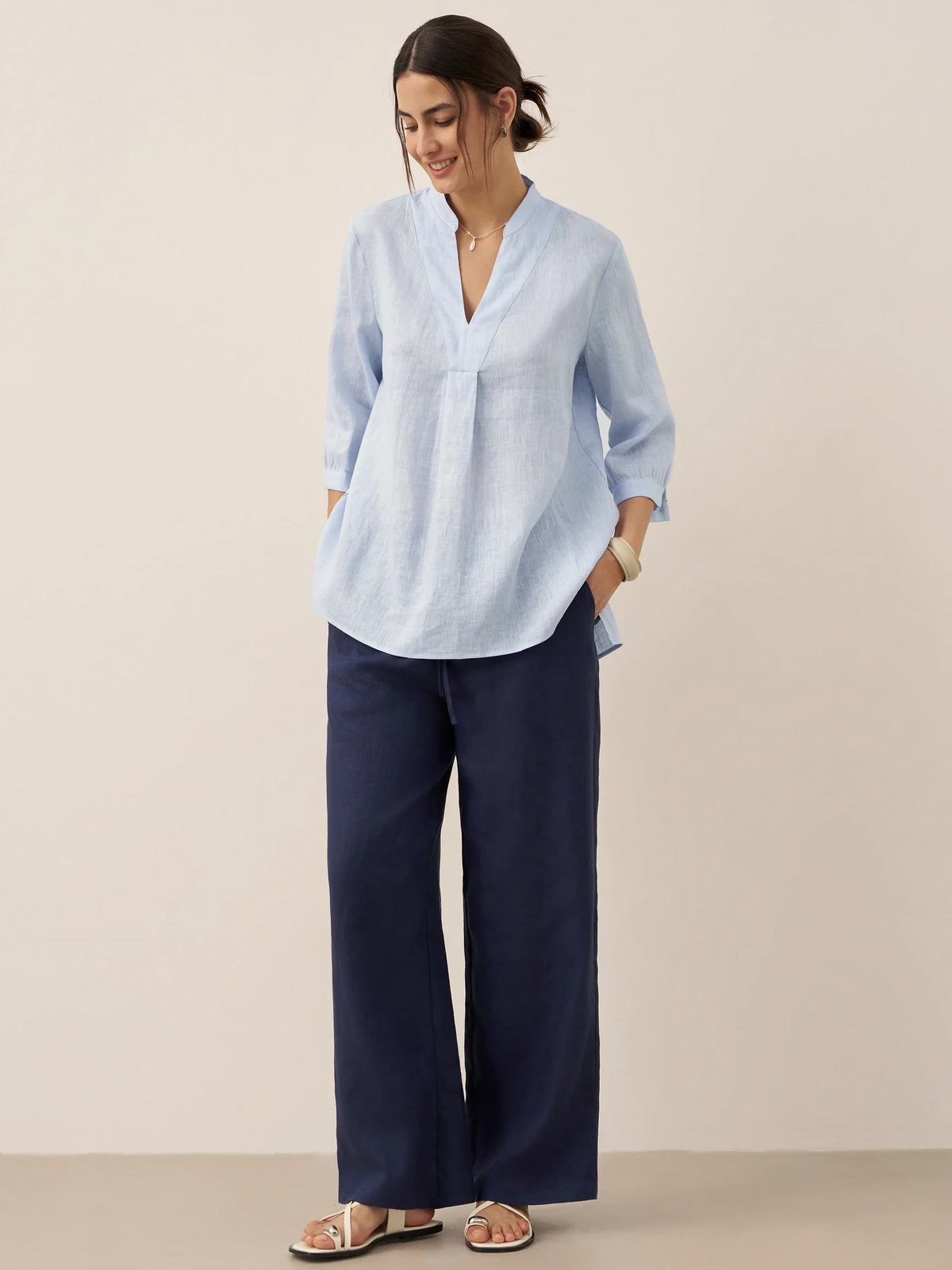 a woman in a blue shirt