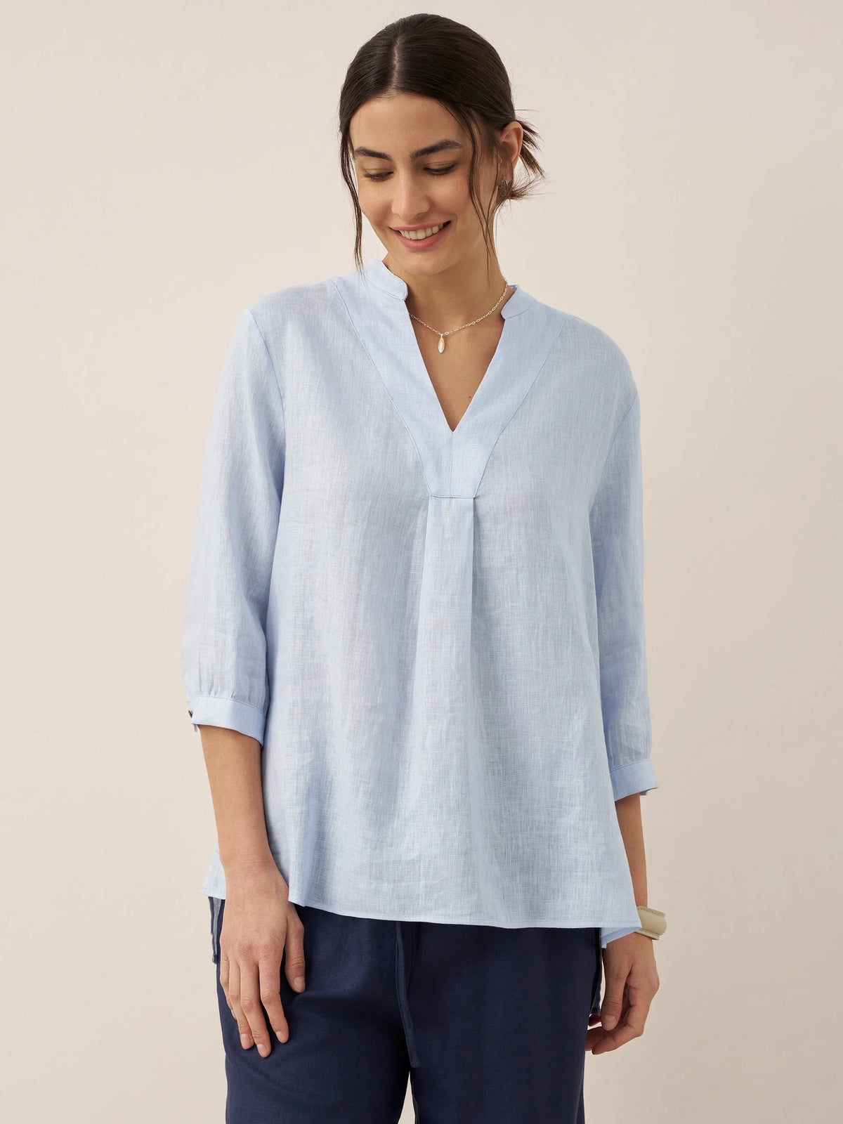 a woman in a blue shirt