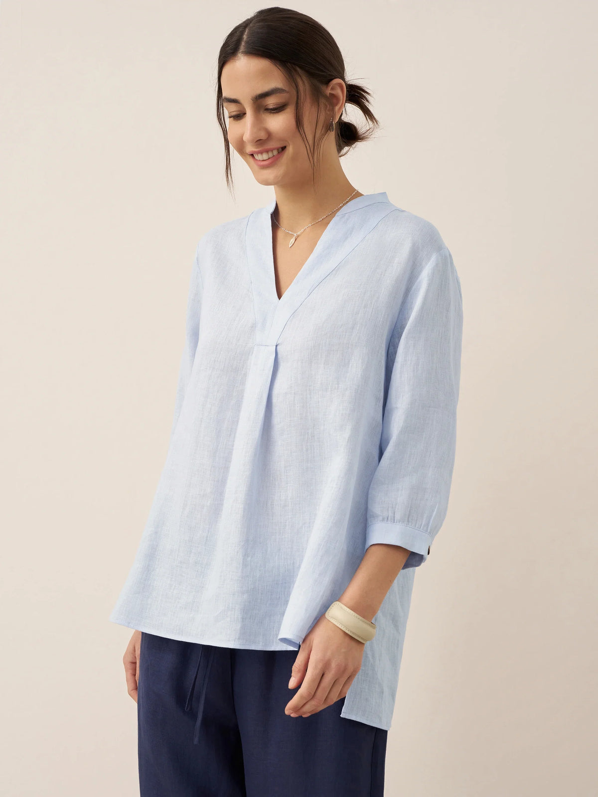a woman in a blue shirt