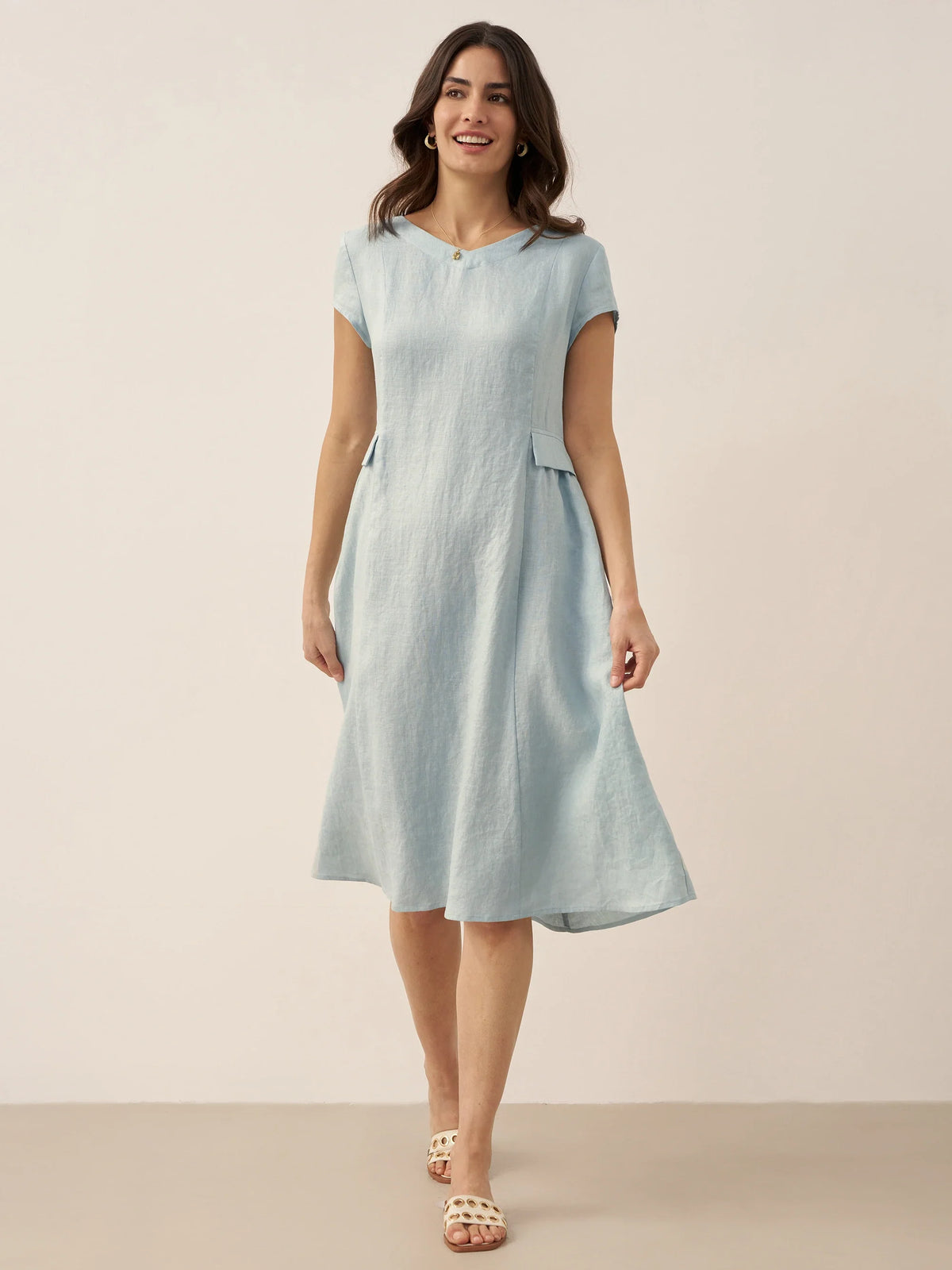a woman in a light blue dress