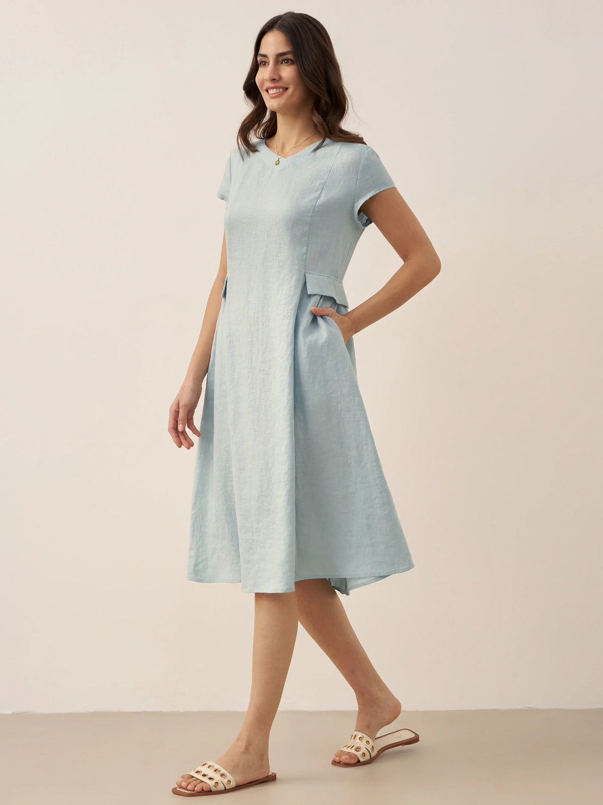 a woman in a light blue dress