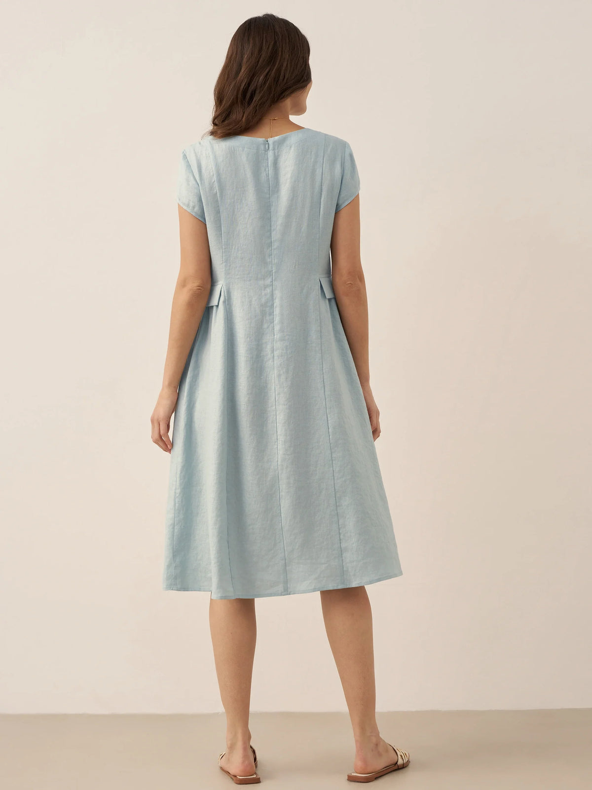 a woman in a light blue dress