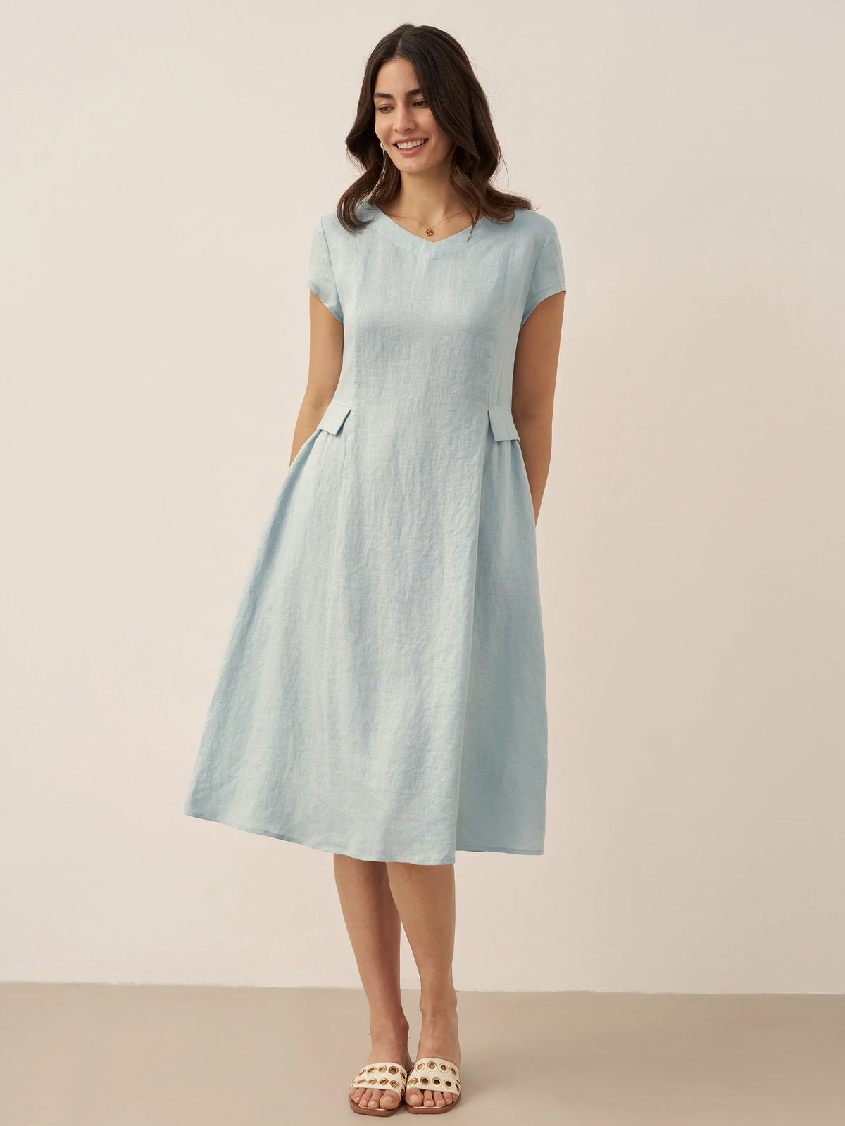 a woman in a light blue dress