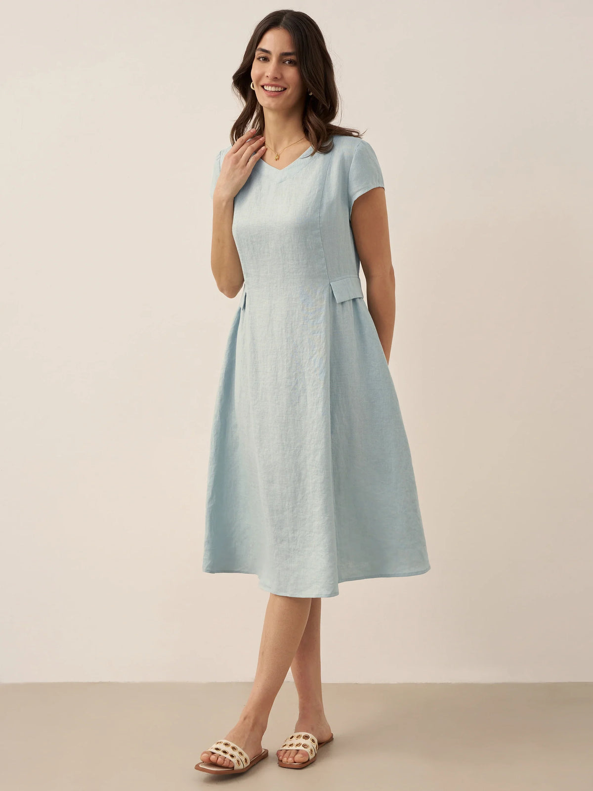 a woman in a light blue dress