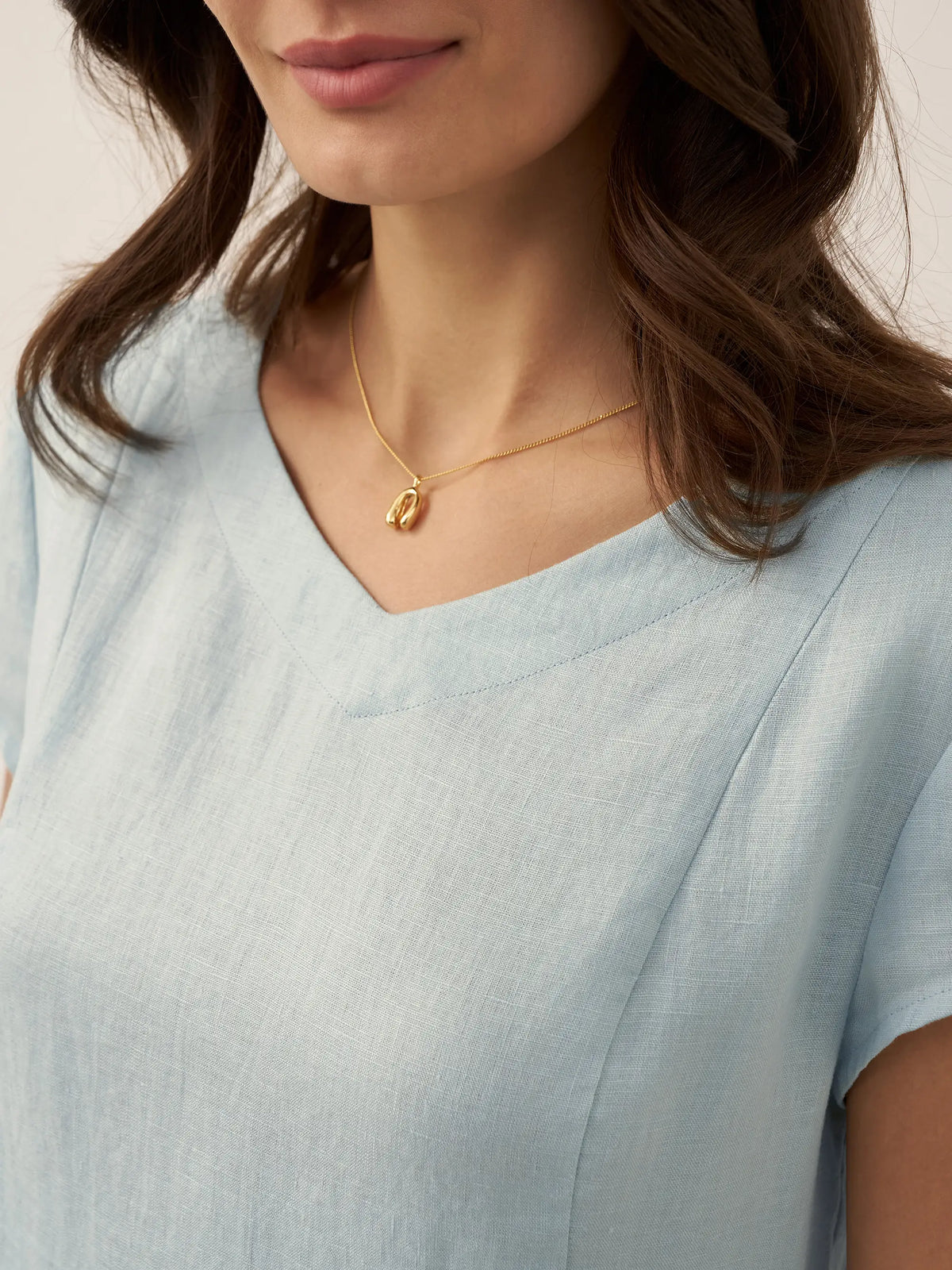 a close up of a woman's neck