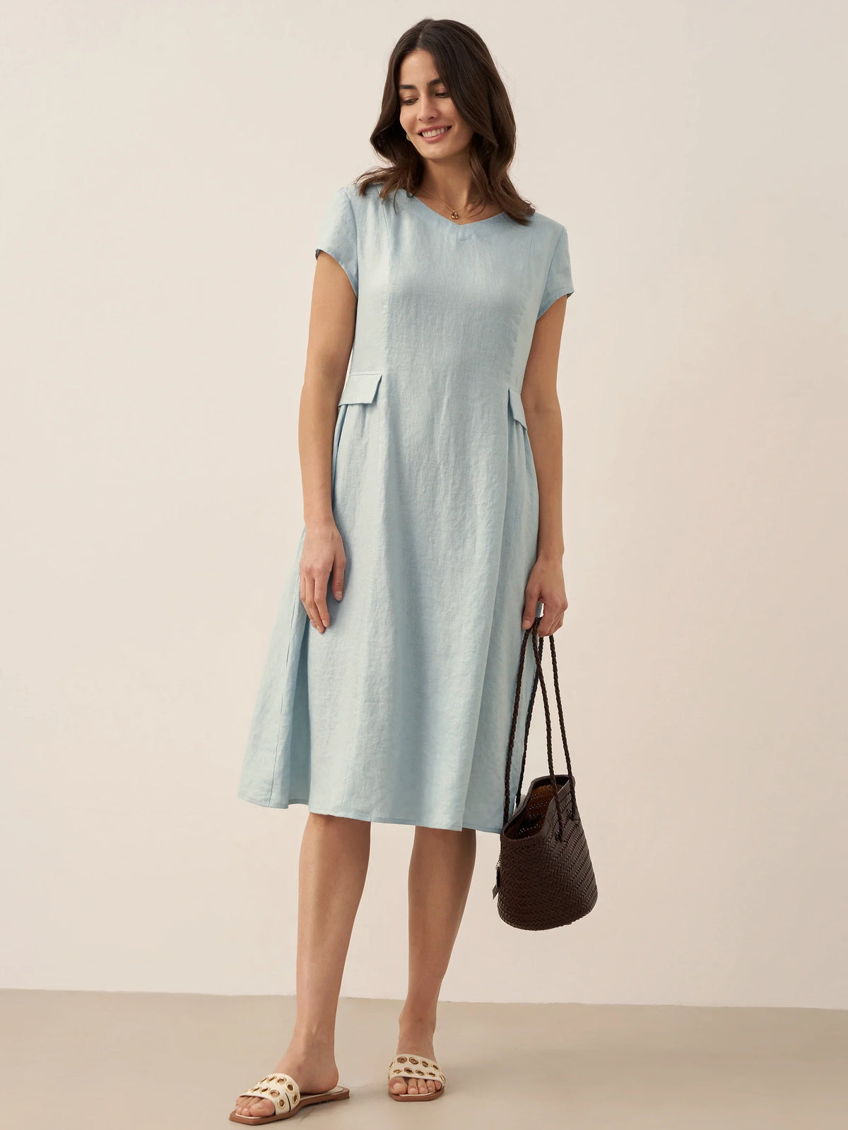 a woman in a light blue dress