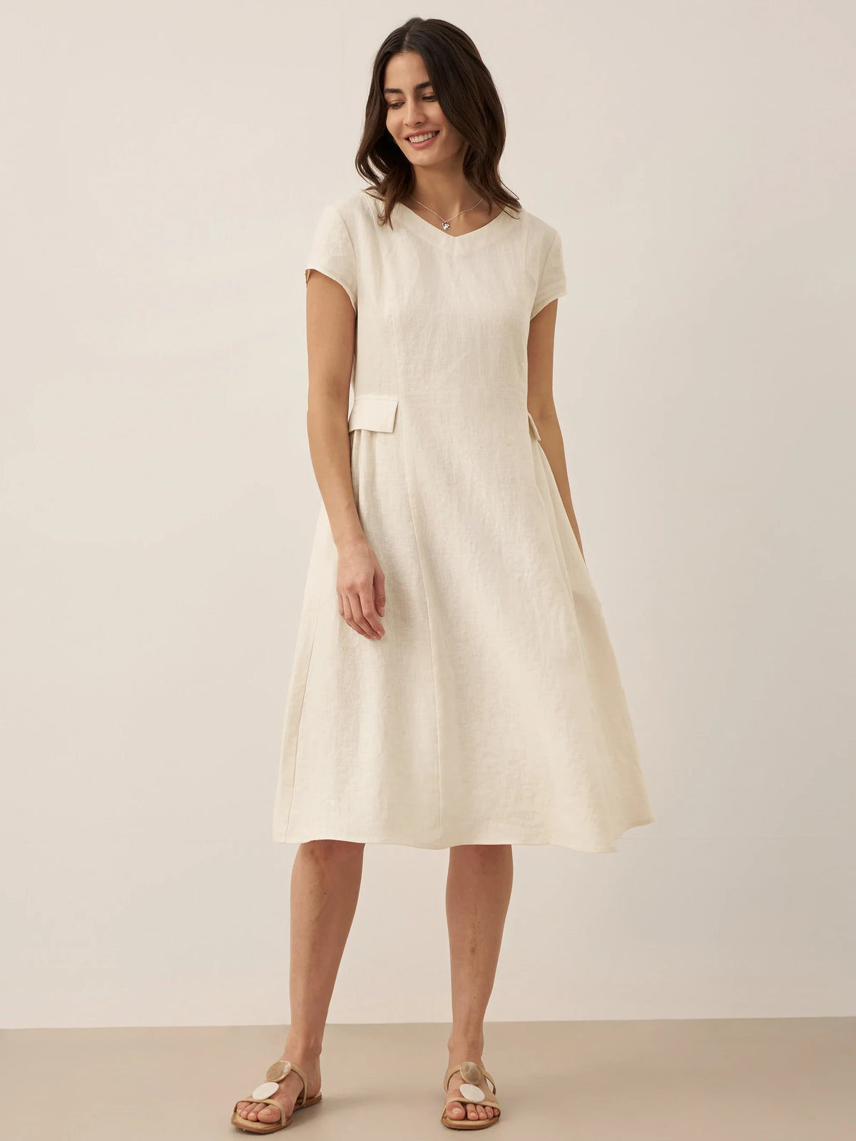 a woman in a white dress