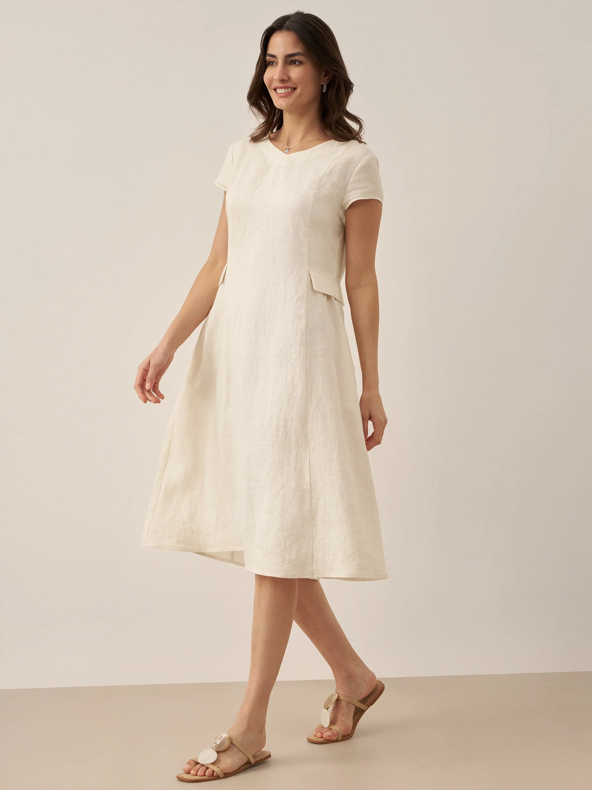 a woman in a white dress