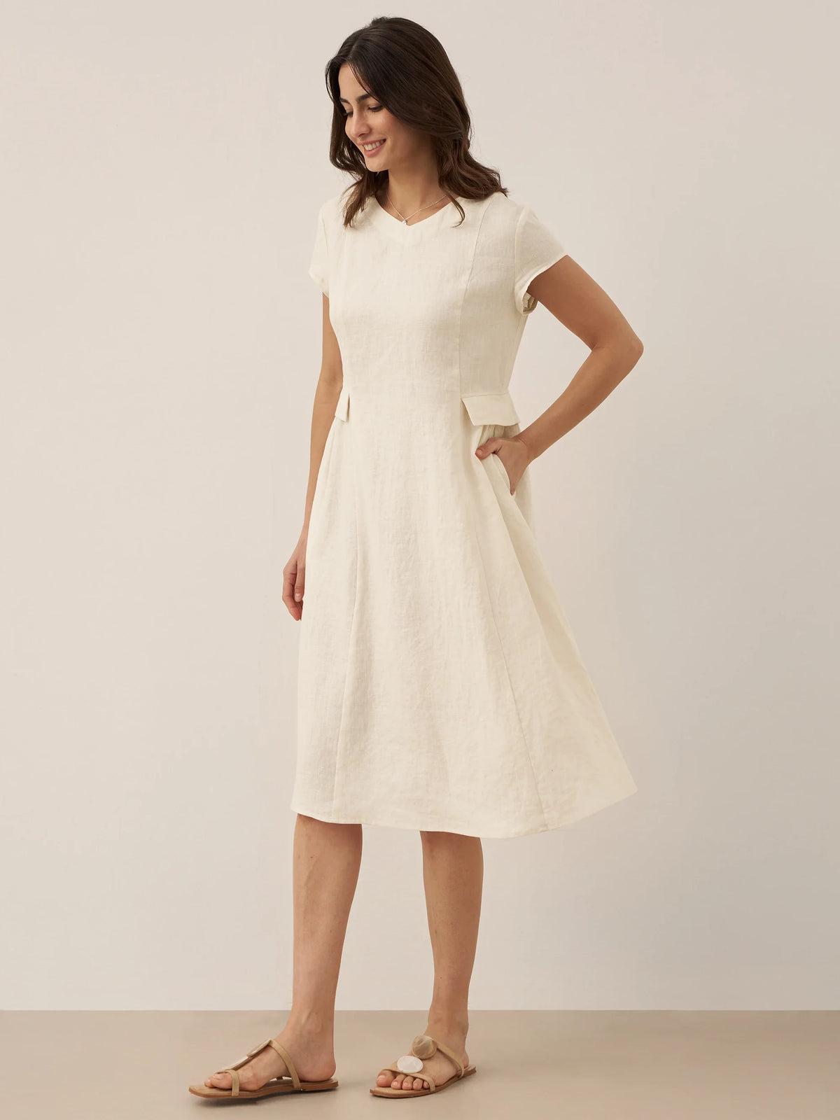 a woman in a white dress