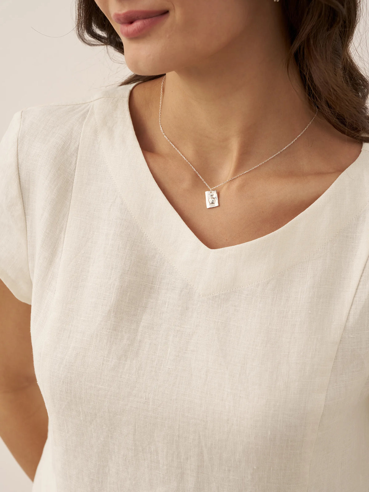 a woman wearing a white shirt