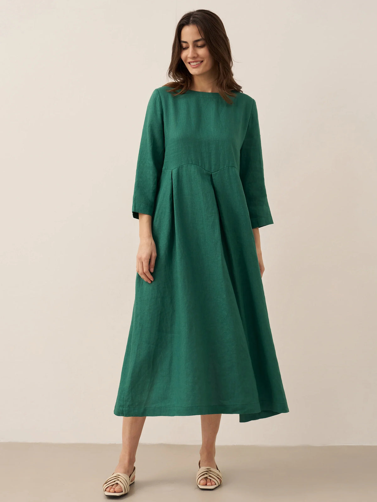 a woman in a green dress