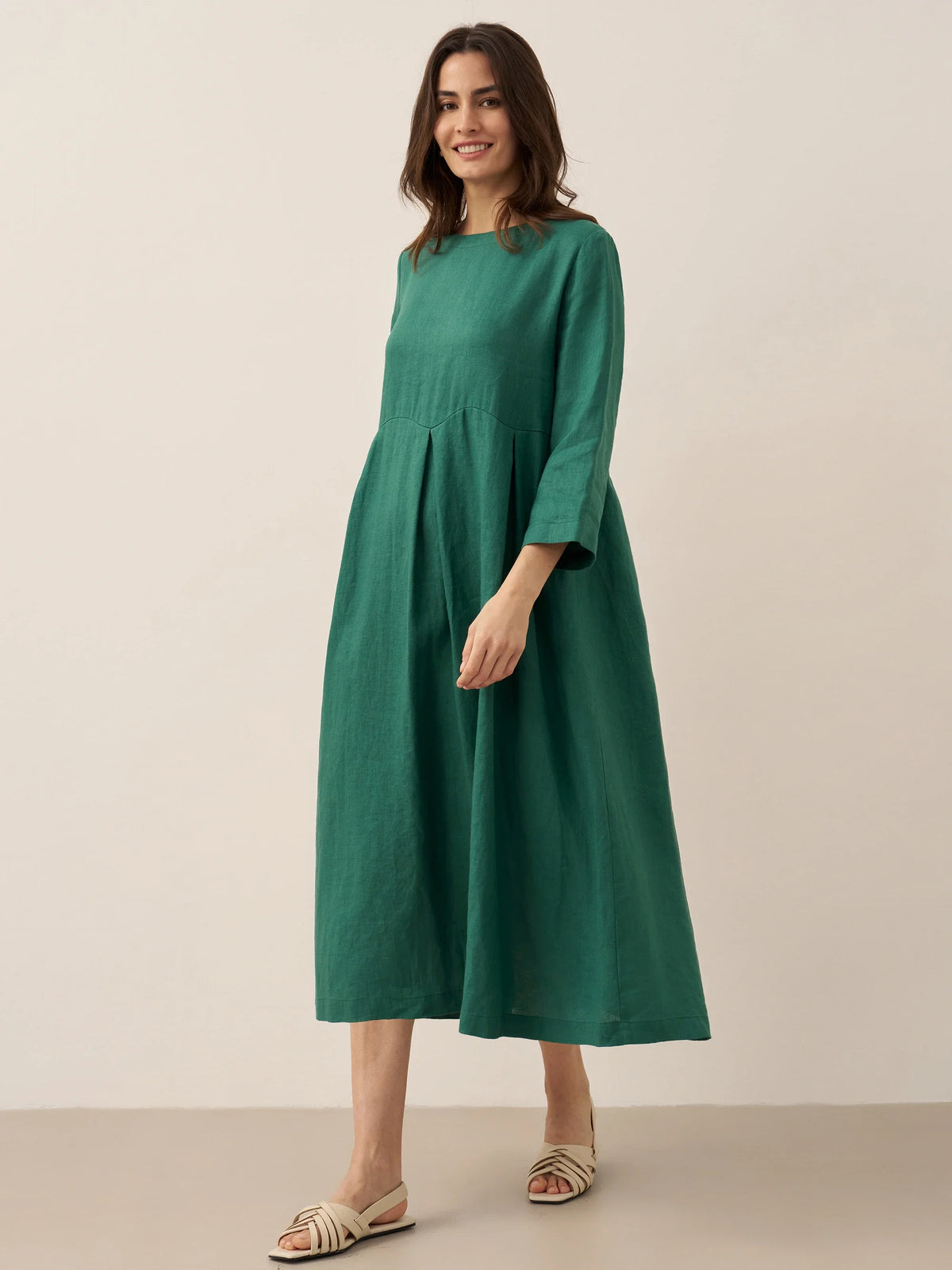 a woman in a green dress