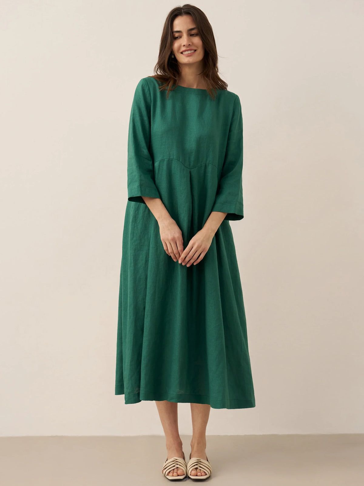 a woman in a green dress