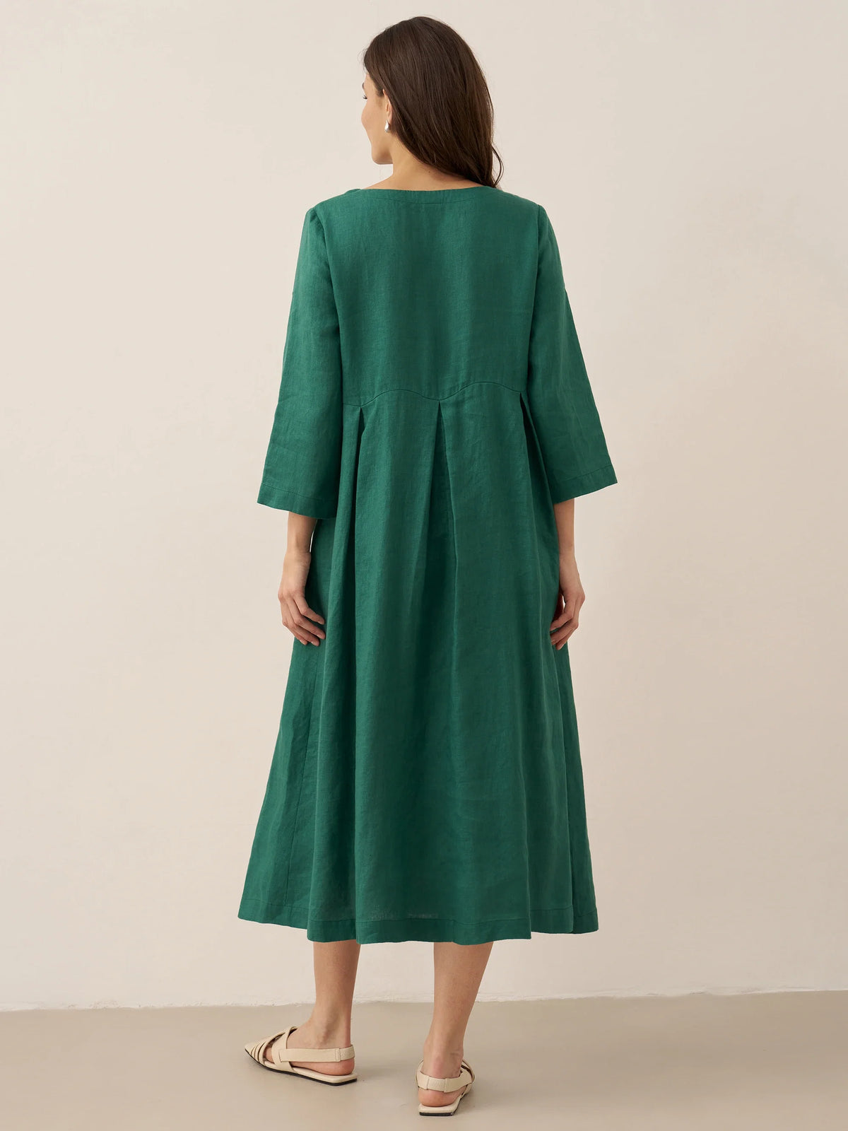 a woman in a green dress