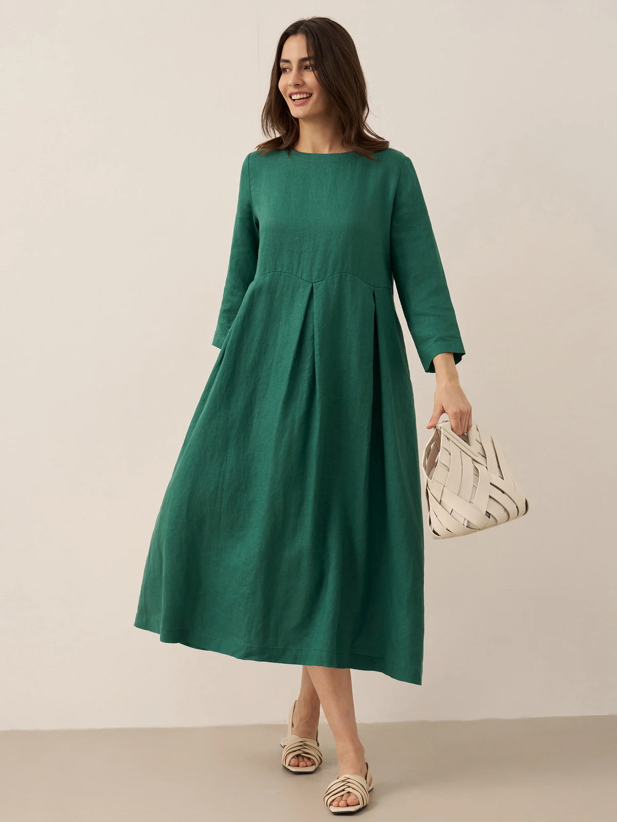 a woman in a green dress