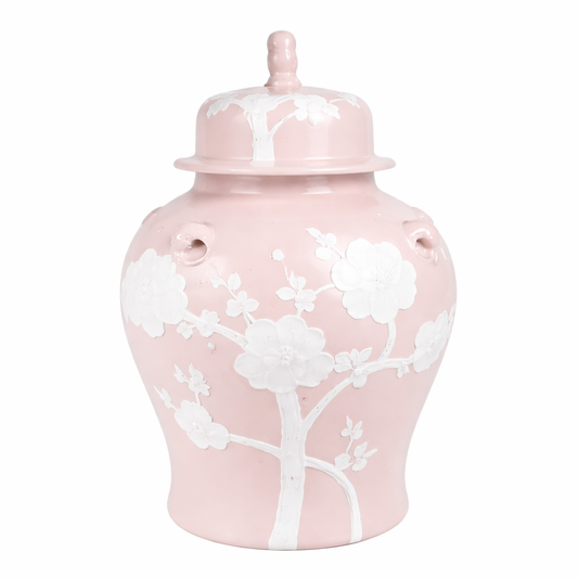 a pink vase with a white design