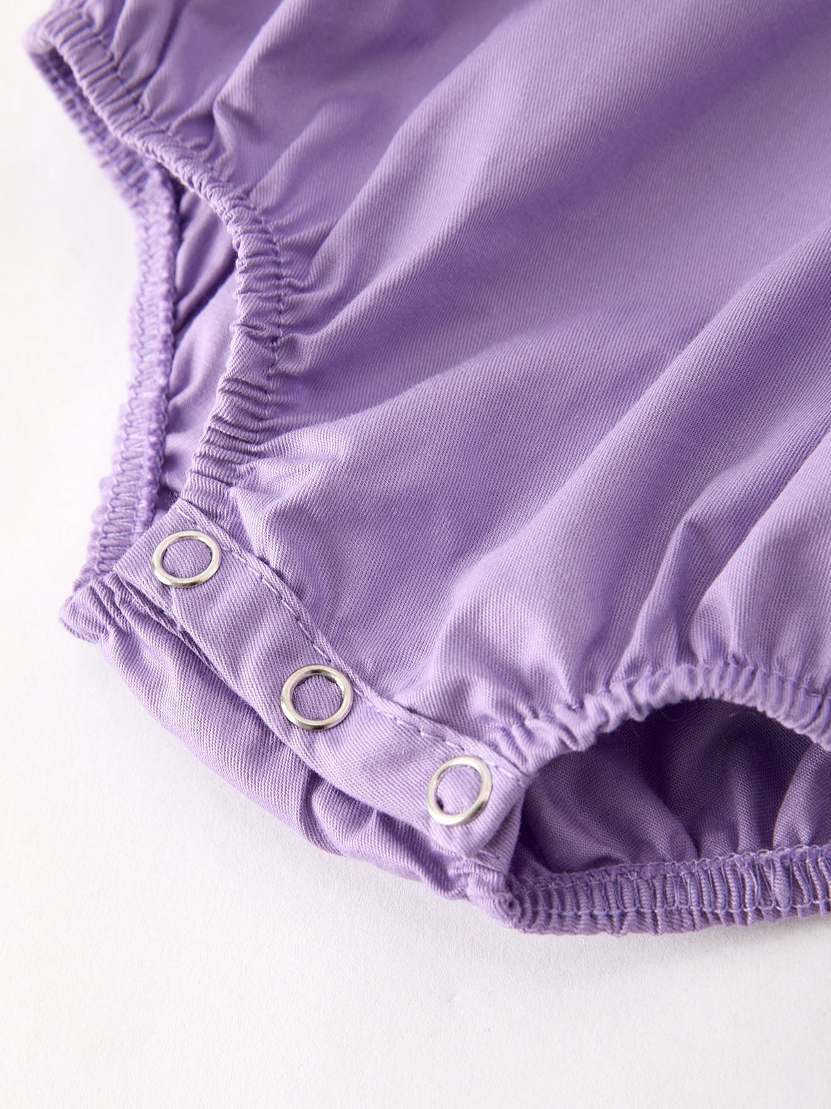 a close up of a purple cloth