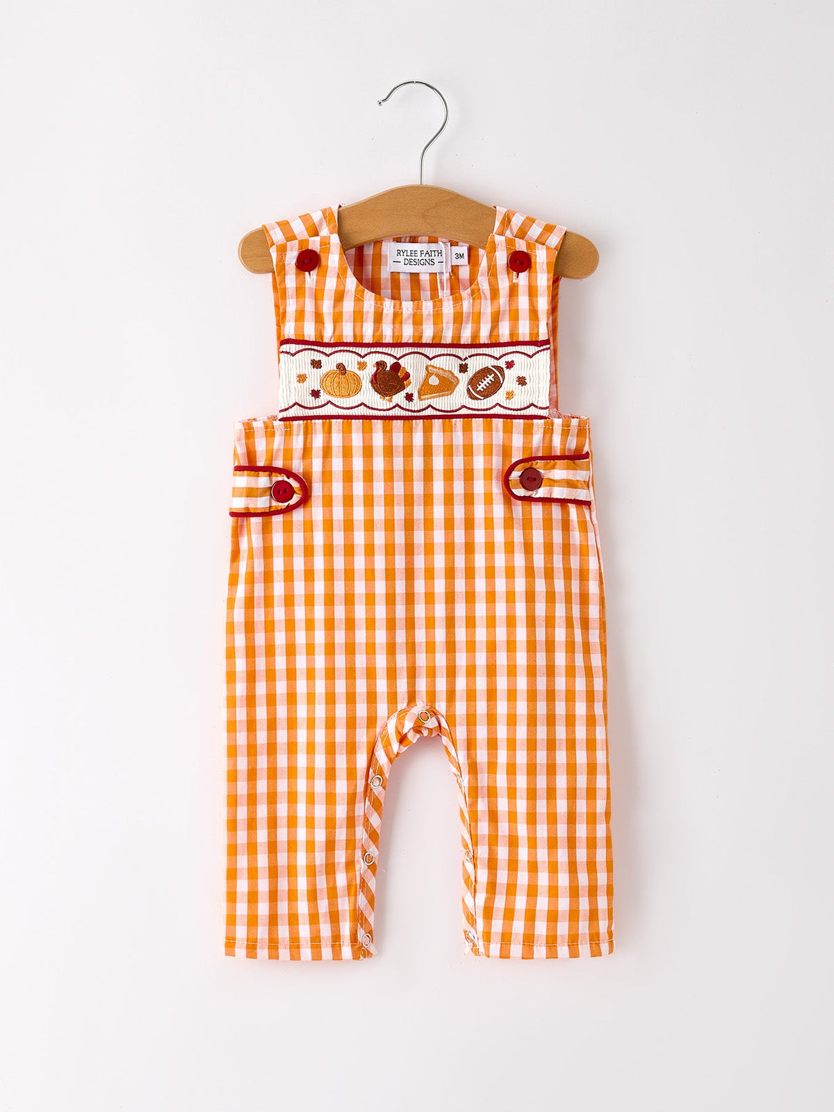 a baby romper on a swinger