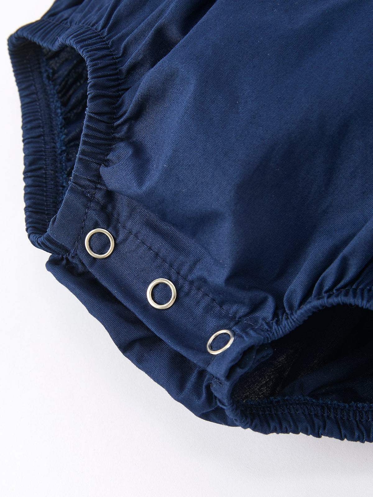 a close up of a pair of blue shorts