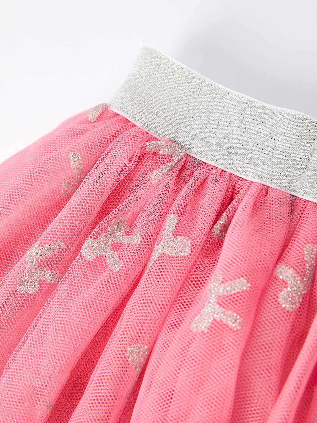a pink tulle skirt with silver sequins