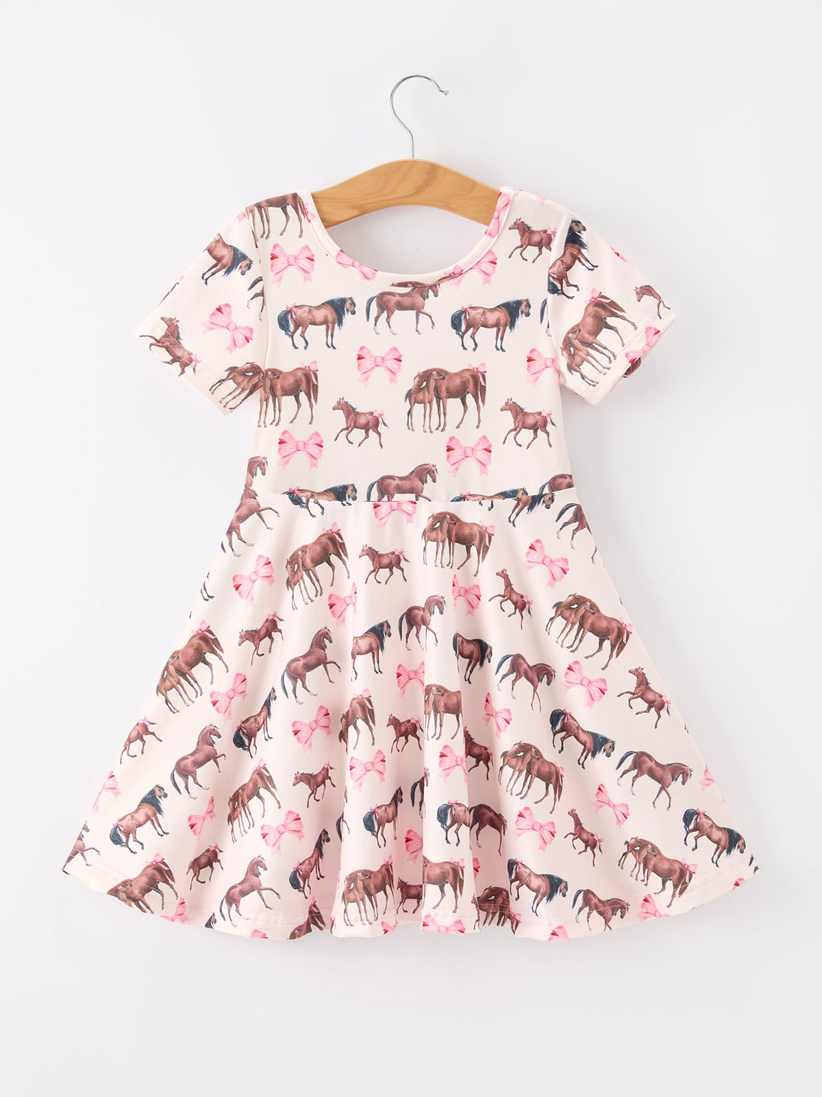 a dress with horses on it
