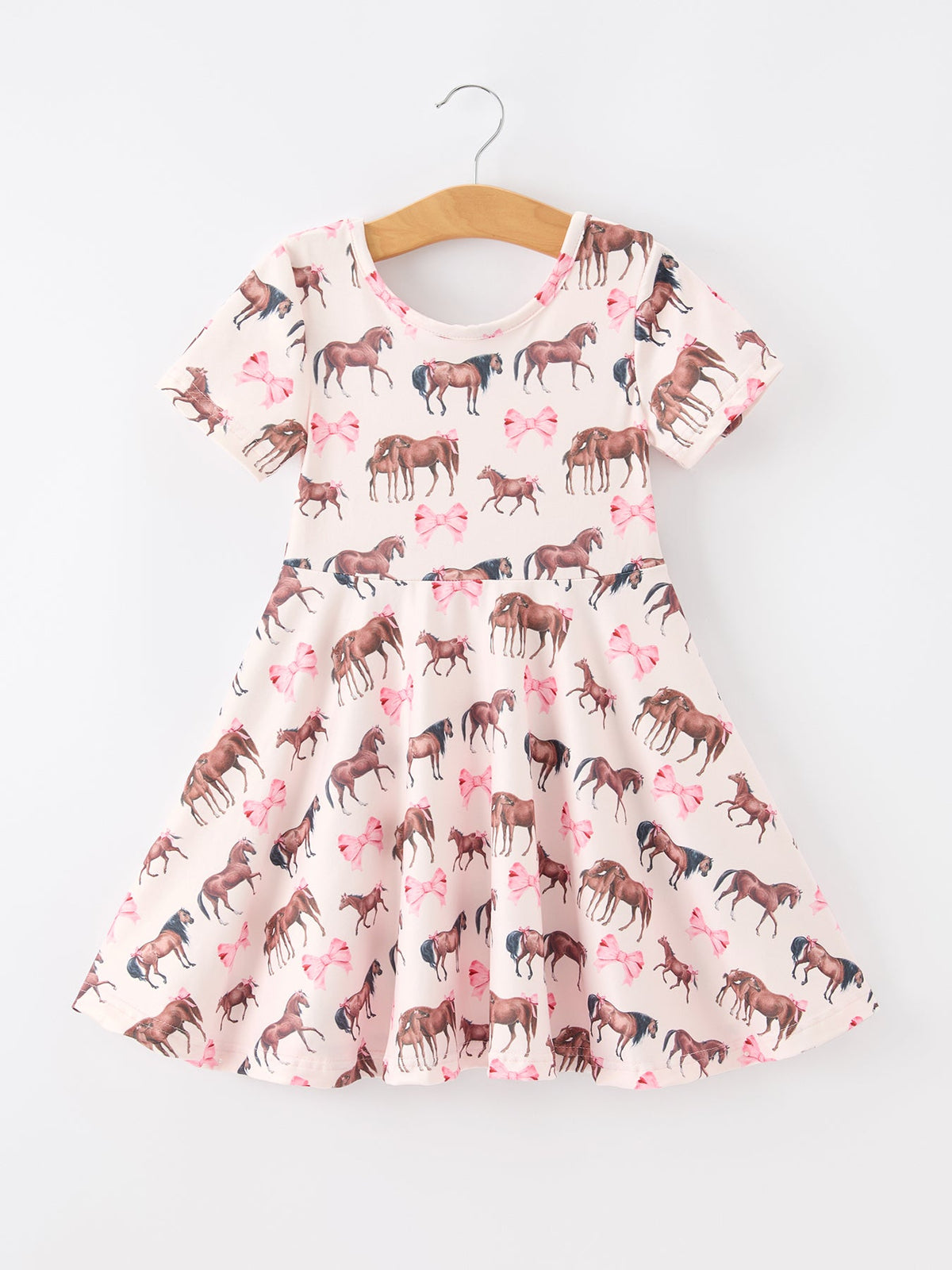 a dress with horses on it