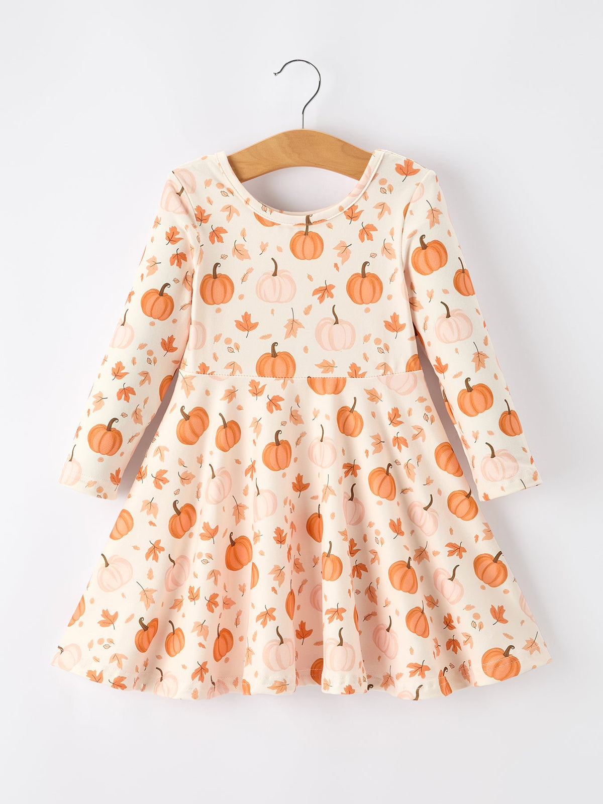 a dress with pumpkins on it