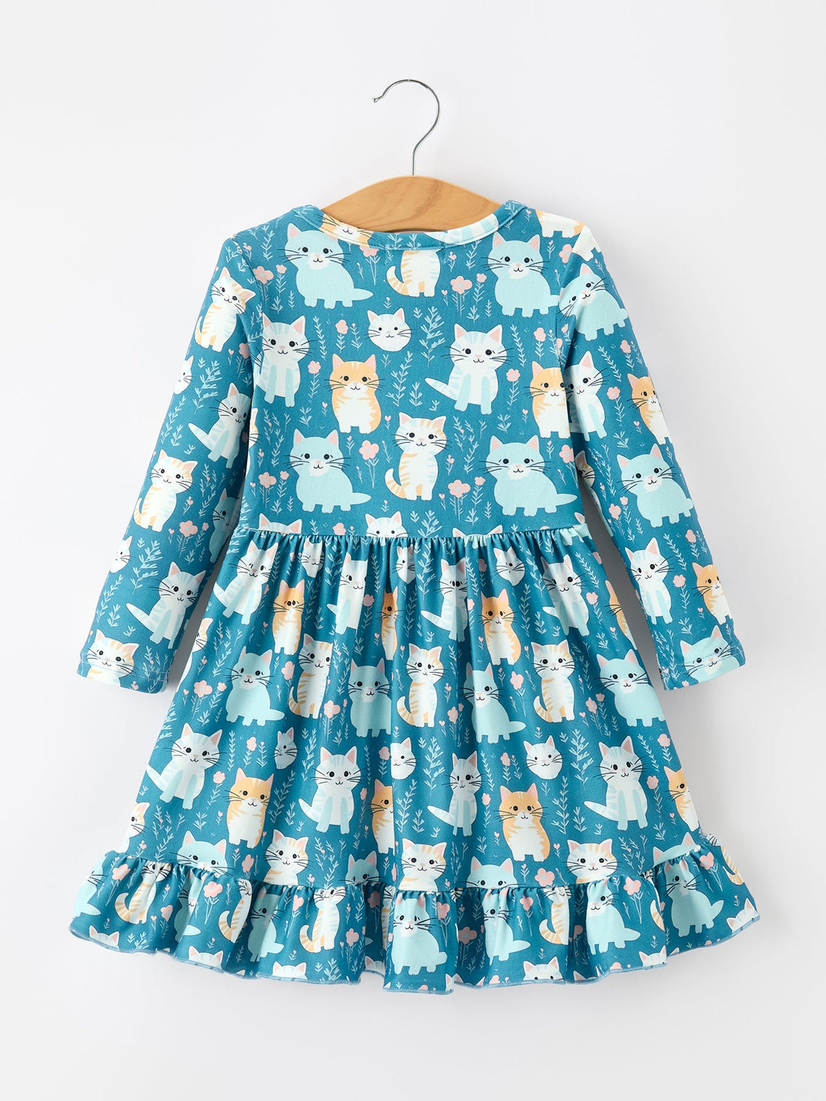 a blue dress with cats on it