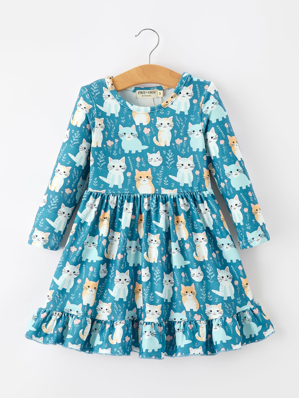 a blue dress with cats on it