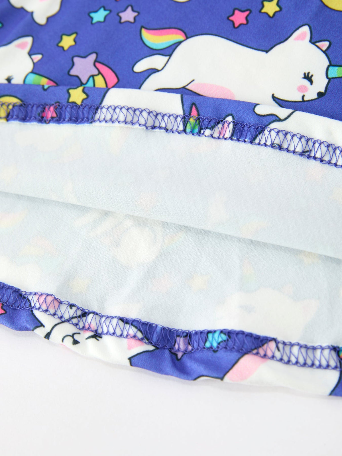 a blue and white fabric with a stitch on it