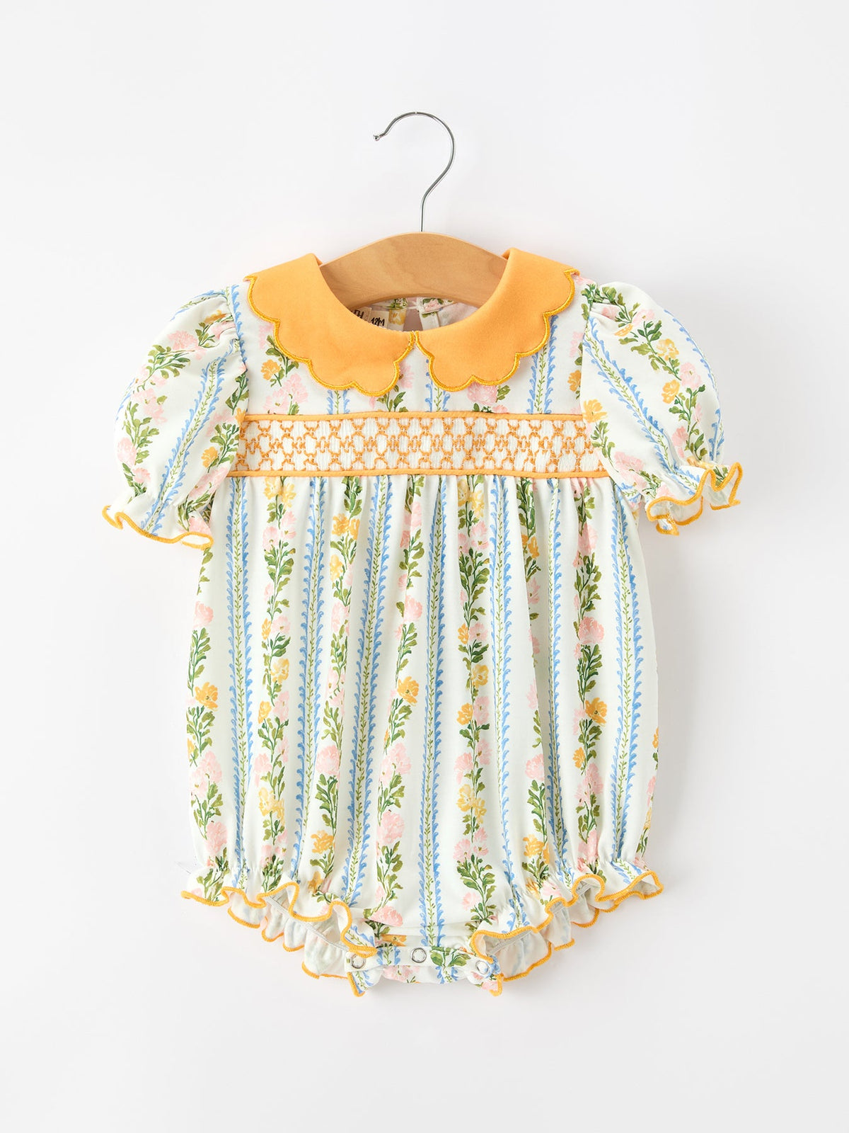 a baby dress on a swinger
