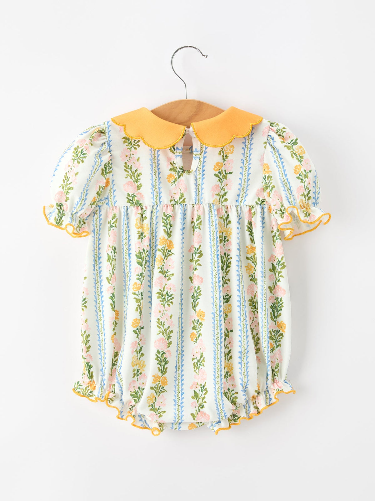 a baby romper on a swinger