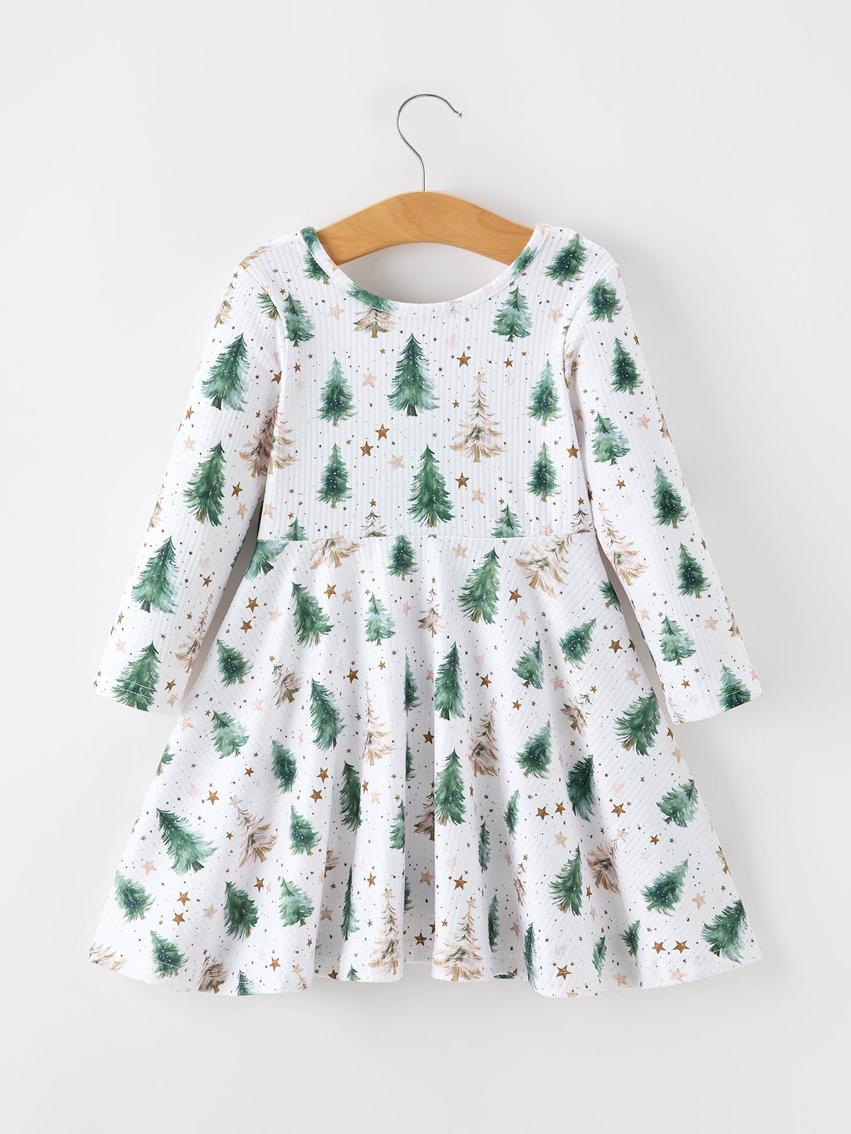 a white dress with trees on it