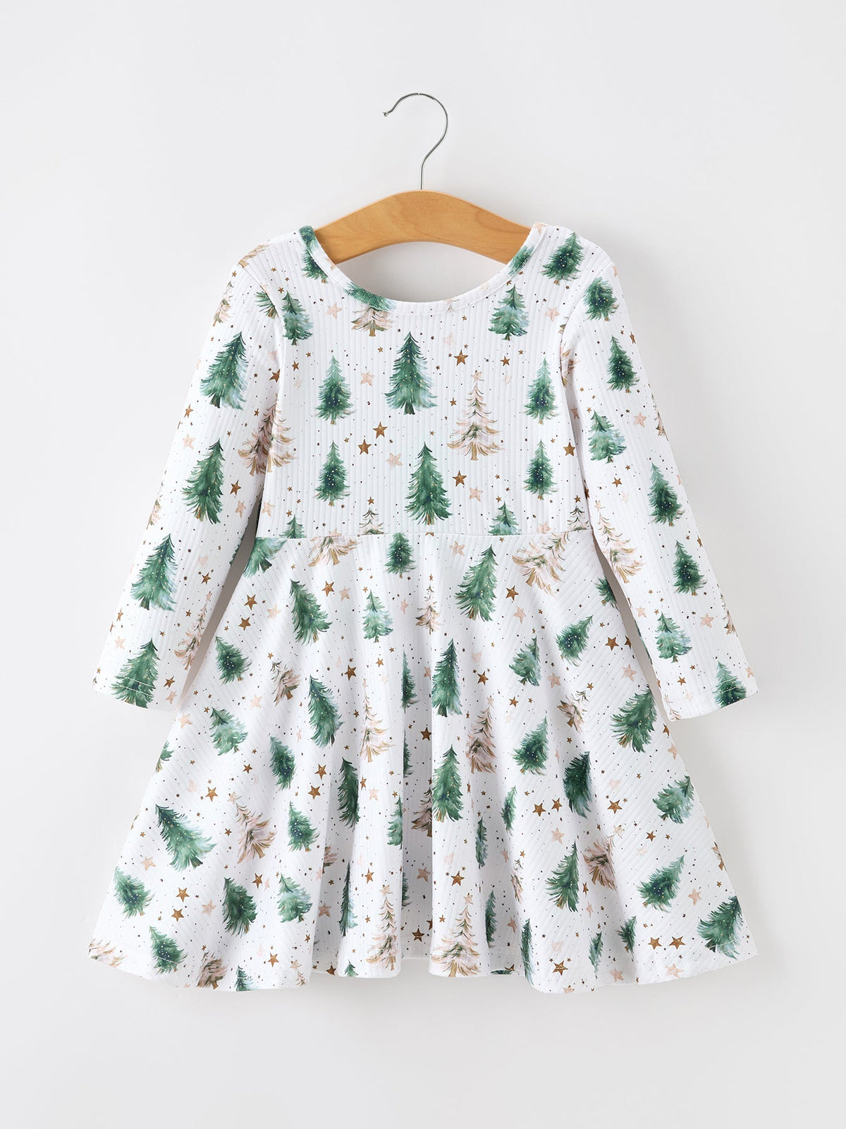a white dress with trees on it