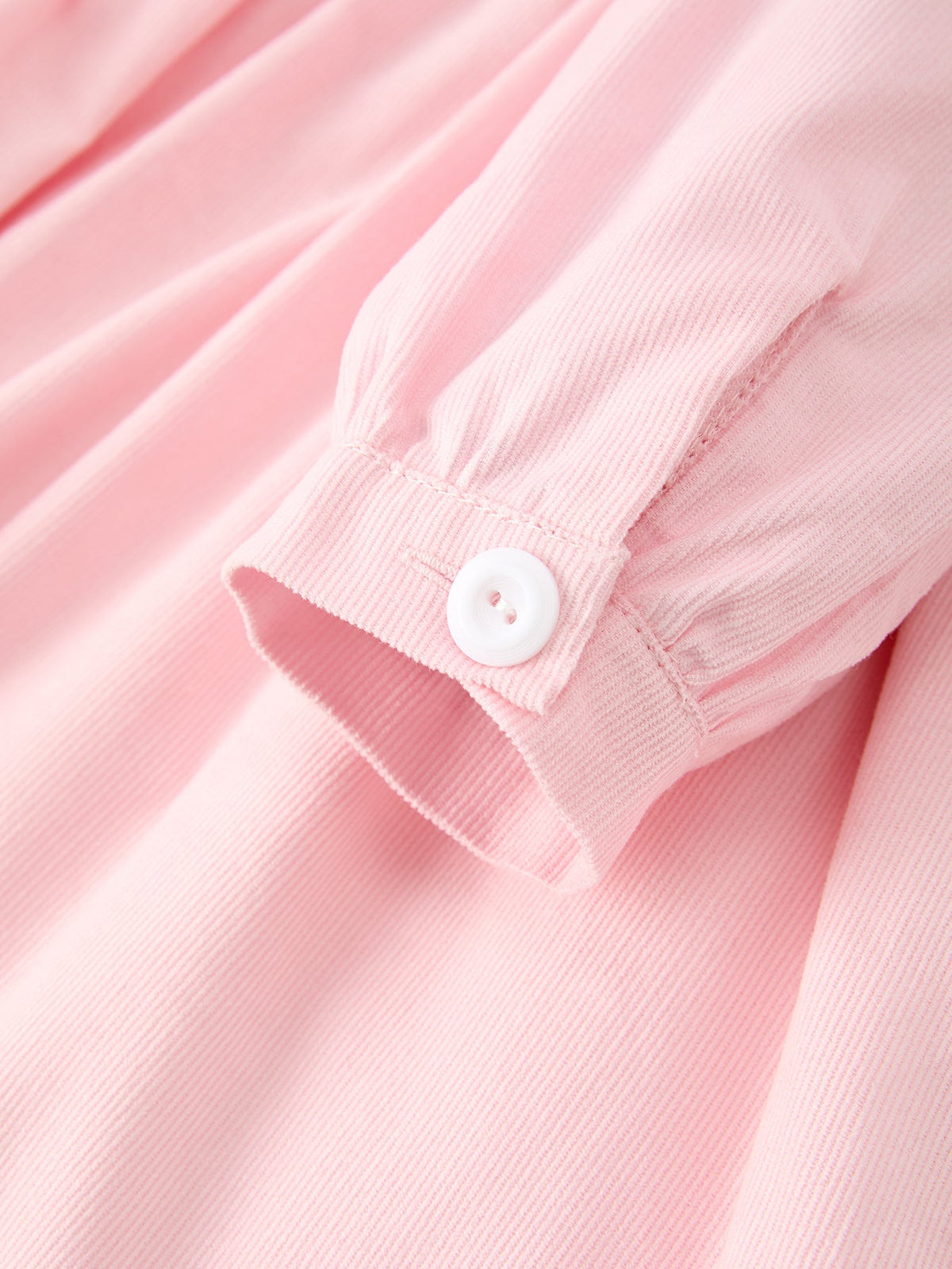 a close up of a pink shirt