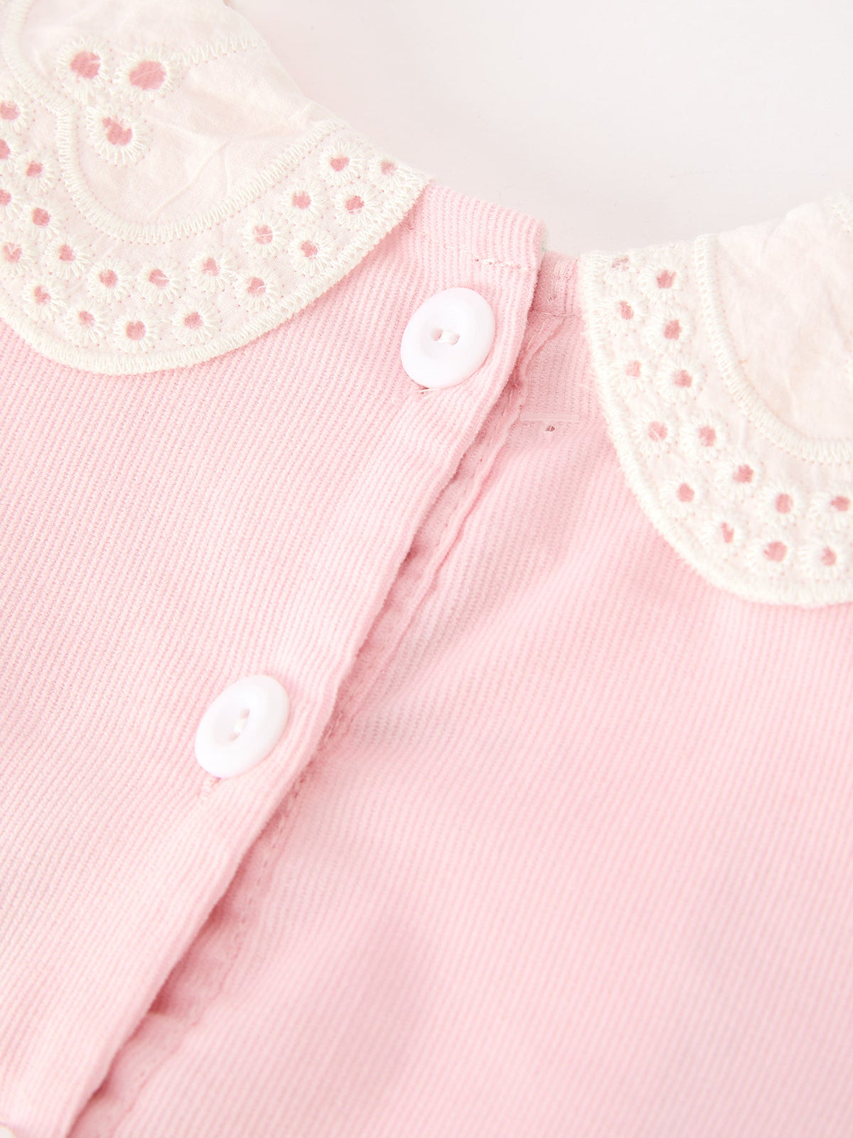 a close up of a pink shirt