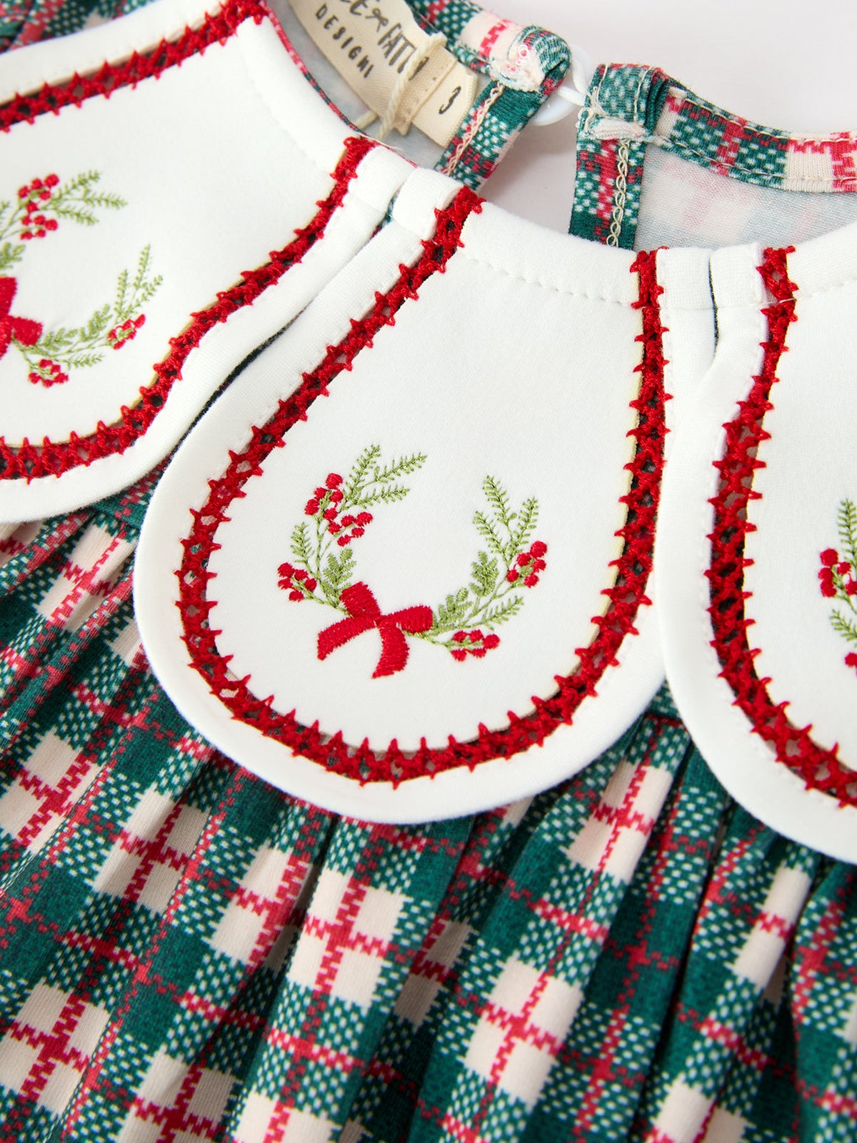 a close up of a baby bib