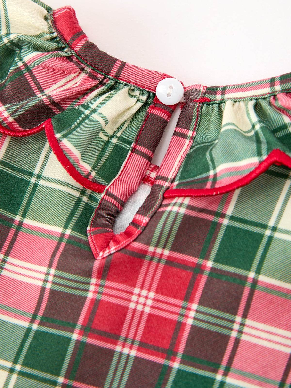 a close up of a plaid shirt