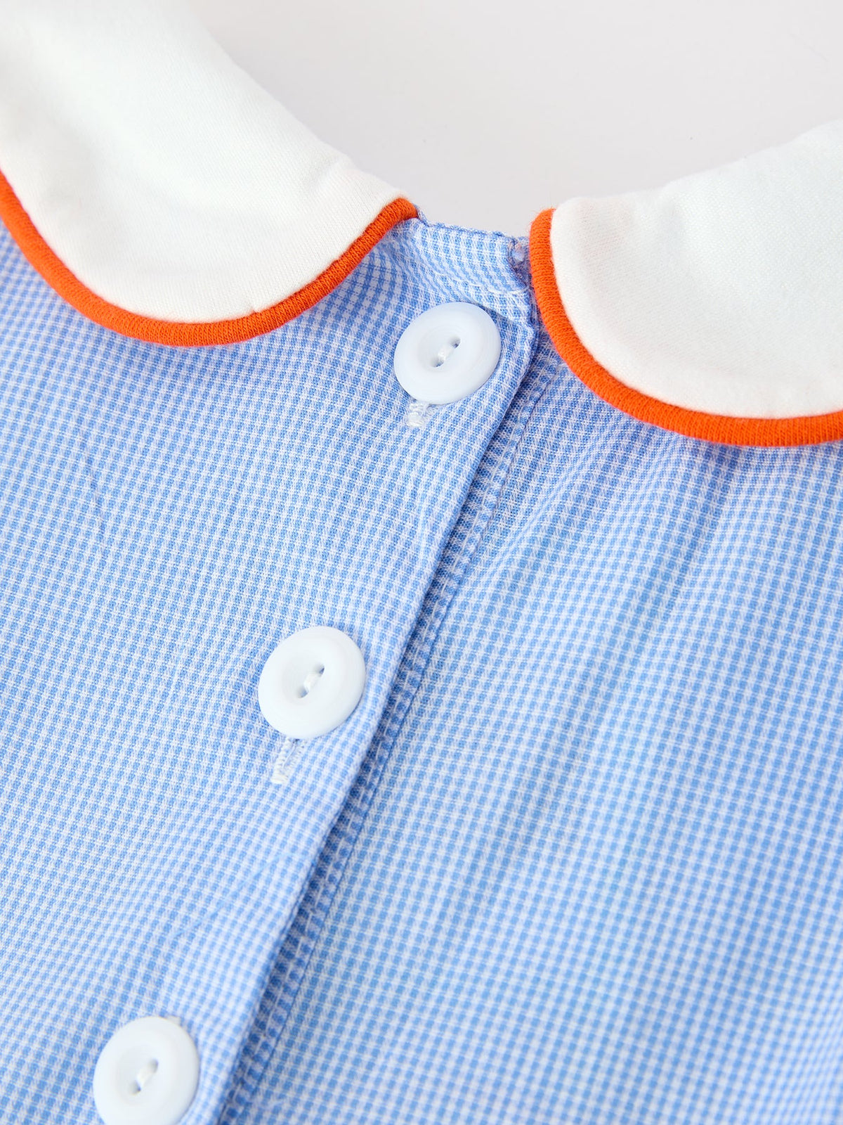 a close up of a blue and white shirt