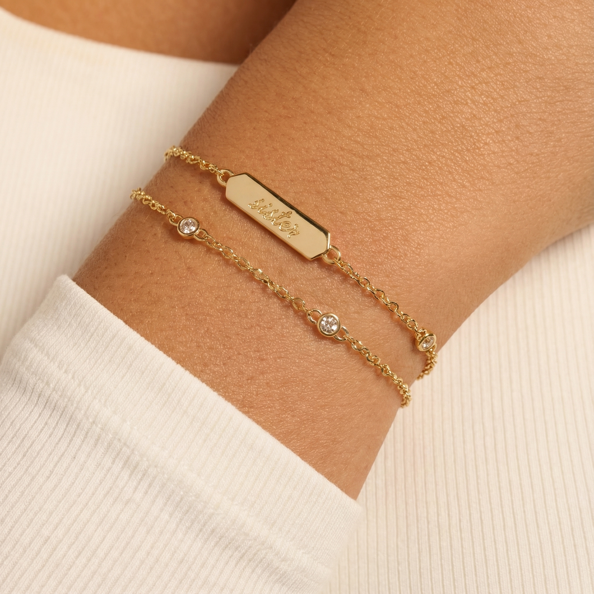 a person wearing a gold bracelet