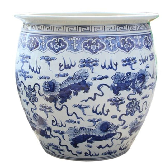 a blue and white vase with a pattern