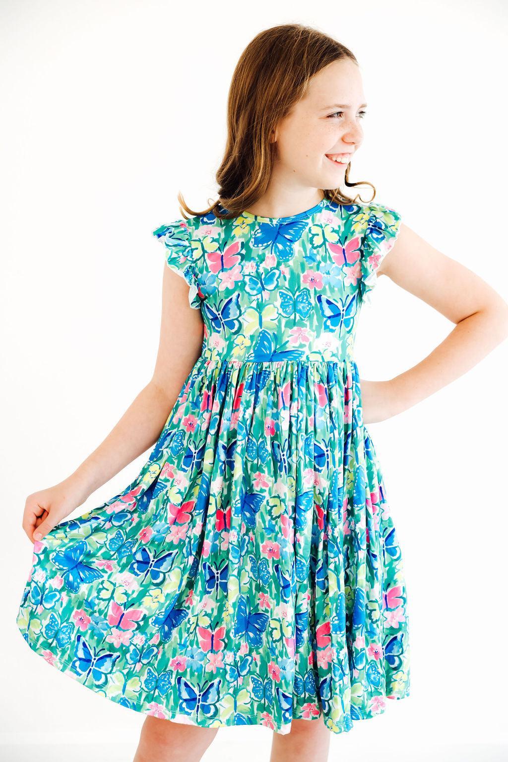 a girl in a dress