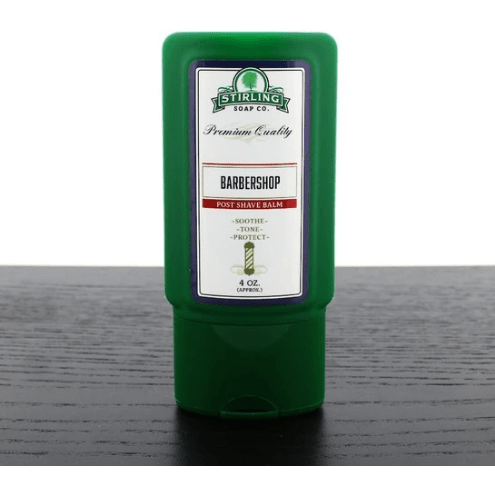 a green bottle of shaving gel