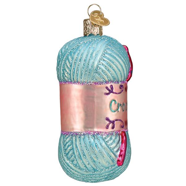 a blue and pink yarn ball ornament