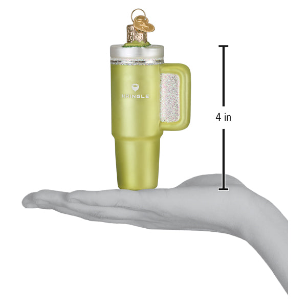 a hand holding a mug