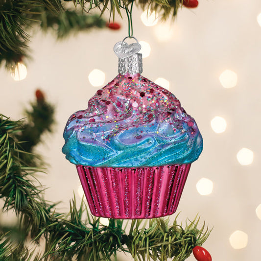 a christmas tree decoration with a cupcake shaped ornament