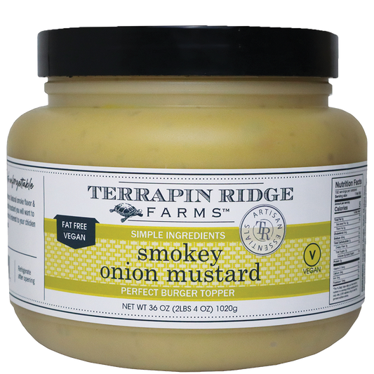 a jar of mustard with a white label