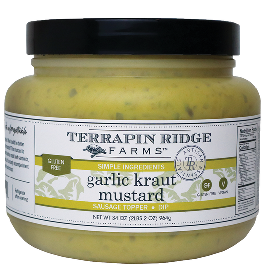 a jar of mustard with a white label