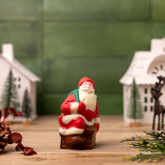 a santa claus figurine on a table